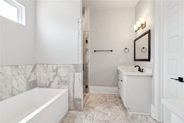 2909 Amelia St, New Orleans, LA 70115 - full bath with vanity, marble look tiles, a bath, and a stall shower