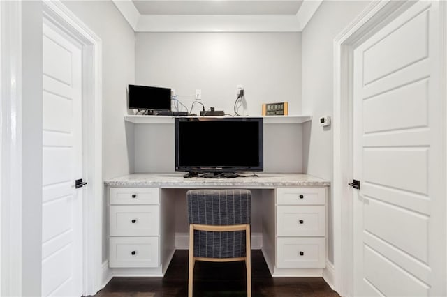 2909 Amelia St, New Orleans, LA 70115 - home office featuring dark wood-style flooring and built in desk