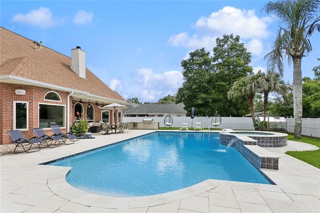299 Sarah Victoria Dr, Belle Chasse, LA 70037 - view of swimming pool featuring a patio area, a fenced backyard, and a pool with connected hot tub
