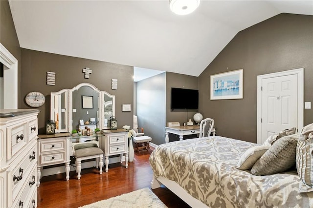299 Sarah Victoria Dr, Belle Chasse, LA 70037 - bedroom with lofted ceiling and dark wood-style flooring