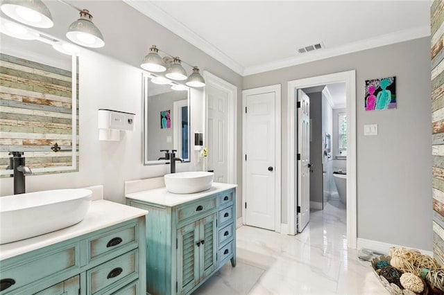 299 Sarah Victoria Dr, Belle Chasse, LA 70037 - bathroom featuring two vanities, marble finish floors, and ornamental molding