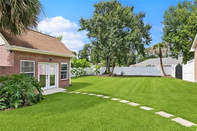 299 Sarah Victoria Dr, Belle Chasse, LA 70037 - fenced backyard with french doors