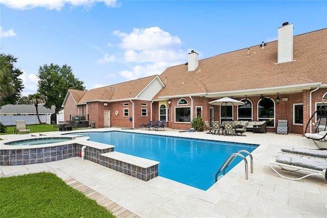 299 Sarah Victoria Dr, Belle Chasse, LA 70037 - view of swimming pool featuring a patio area, an outdoor living space, and a pool with connected hot tub