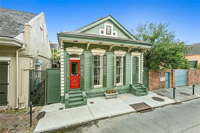718 Ursulines Ave Unit D, New Orleans, LA 70116 - view of front of property with a gate