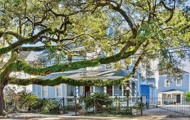 2512 Magazine St Unit D, New Orleans, LA 70130 - view of front of property featuring a fenced front yard