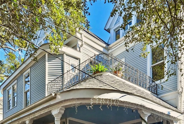 2512 Magazine St Unit D, New Orleans, LA 70130 - view of home's exterior featuring stairway and a balcony
