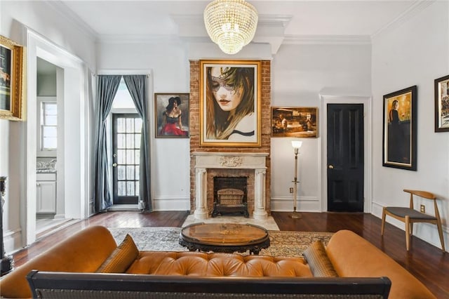 2512 Magazine St Unit D, New Orleans, LA 70130 - living room featuring wood finished floors, a chandelier, a fireplace, and ornamental molding