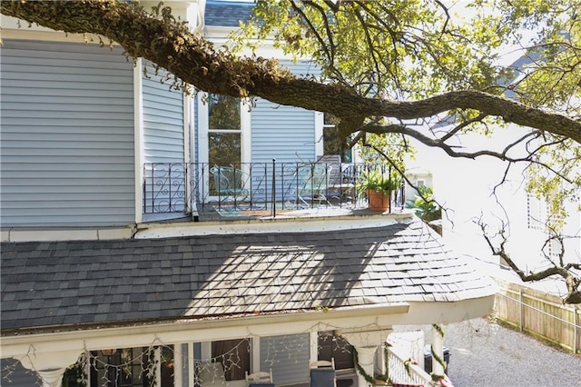 2512 Magazine St Unit D, New Orleans, LA 70130 - view of property exterior with roof with shingles