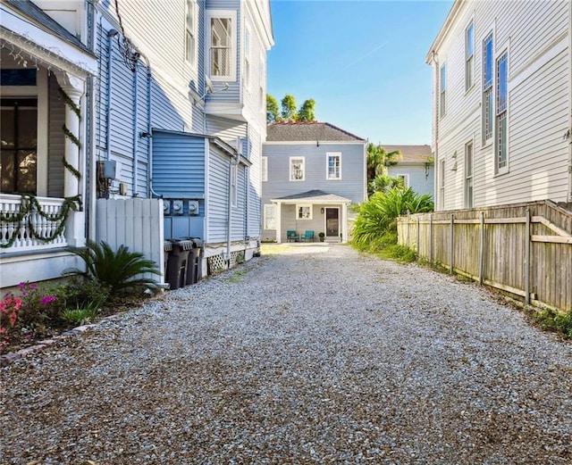 2512 Magazine St Unit D, New Orleans, LA 70130 - view of property exterior featuring gravel driveway