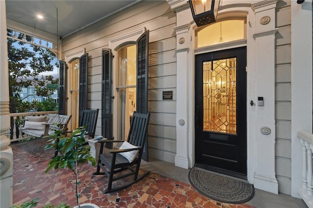 639 Esplanade Ave, New Orleans, LA 70116 - doorway to property featuring covered porch