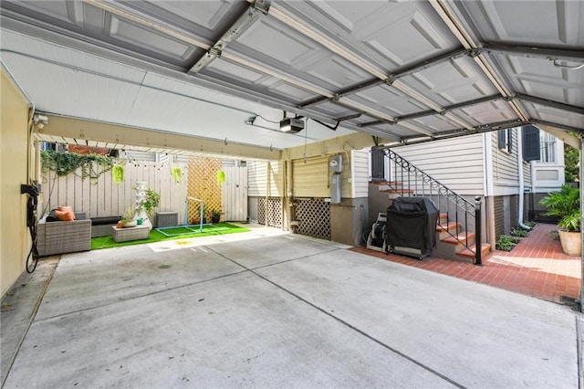 639 Esplanade Ave, New Orleans, LA 70116 - garage featuring a garage door opener