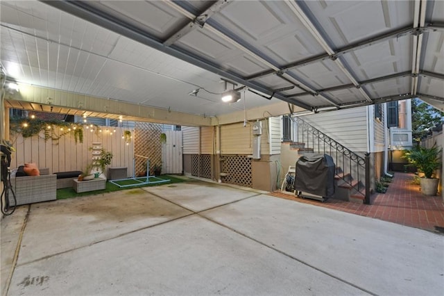639 Esplanade Ave, New Orleans, LA 70116 - garage featuring a garage door opener