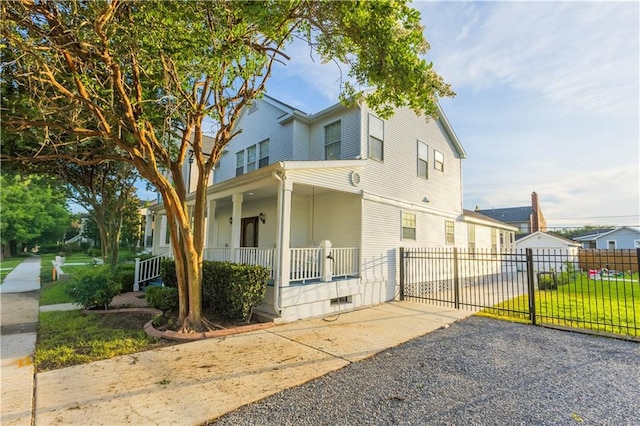 6640 Louisville St, New Orleans, LA 70124 - view of front of home with covered porch and concrete driveway