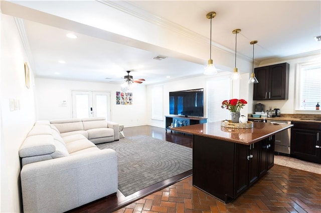 6640 Louisville St, New Orleans, LA 70124 - kitchen featuring stainless steel dishwasher, ornamental molding, open floor plan, a kitchen island, and decorative light fixtures