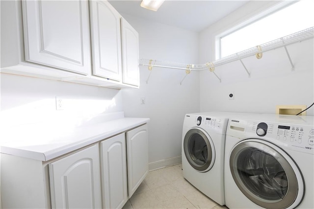 6640 Louisville St, New Orleans, LA 70124 - washroom featuring cabinet space and washer and dryer
