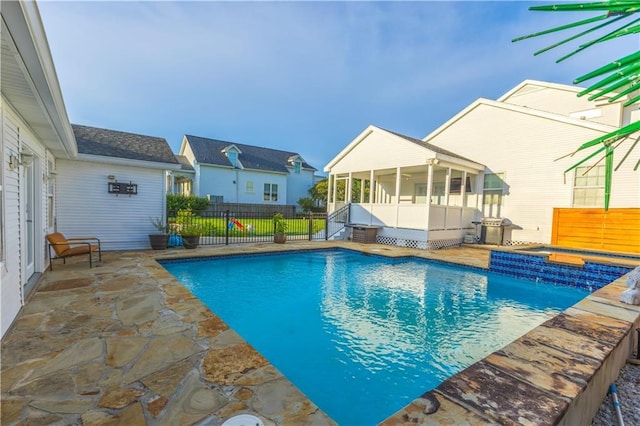 6640 Louisville St, New Orleans, LA 70124 - view of swimming pool featuring a sunroom and a patio area