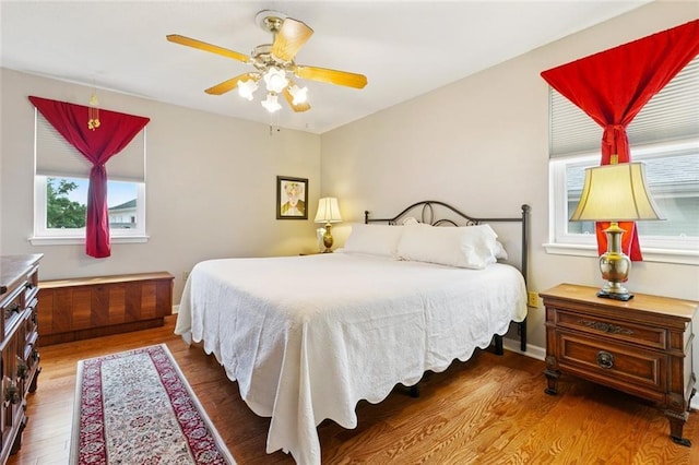 4519 Bancroft Dr, New Orleans, LA 70122 - bedroom with wood finished floors and a ceiling fan