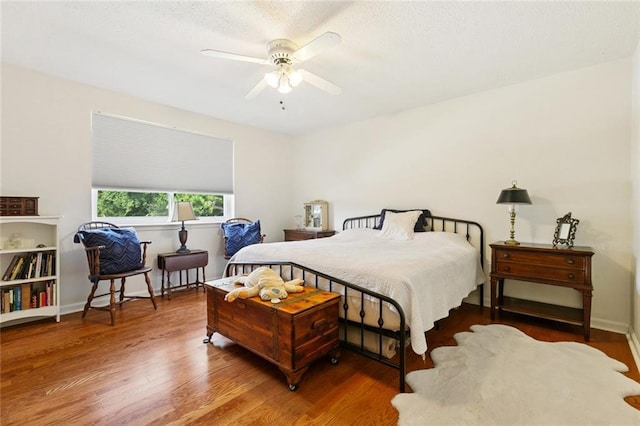 4519 Bancroft Dr, New Orleans, LA 70122 - bedroom featuring wood finished floors and a ceiling fan