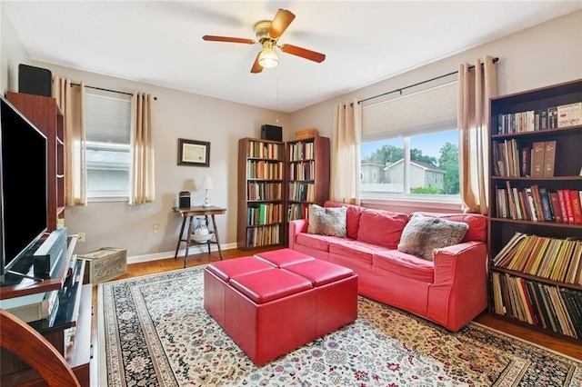 4519 Bancroft Dr, New Orleans, LA 70122 - living area featuring wood finished floors and ceiling fan
