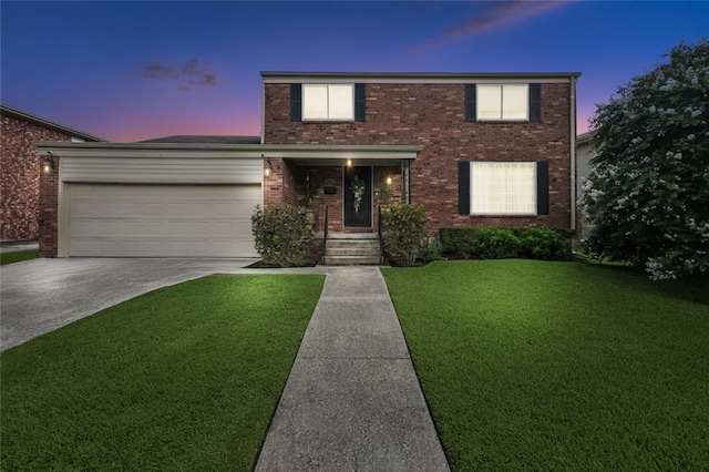 4519 Bancroft Dr, New Orleans, LA 70122 - traditional home with brick siding, a yard, concrete driveway, and a garage