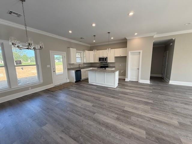 53357 Phillips Path, Loranger, LA 70446 - kitchen featuring appliances with stainless steel finishes, open floor plan, a chandelier, crown molding, and recessed lighting