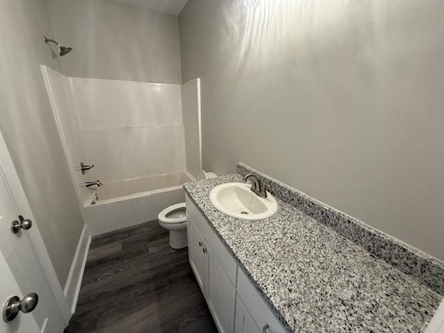 53357 Phillips Path, Loranger, LA 70446 - bathroom with vanity, washtub / shower combination, and wood finished floors