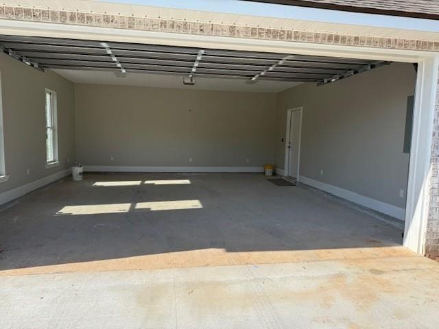 53357 Phillips Path, Loranger, LA 70446 - garage with baseboards and a garage door opener