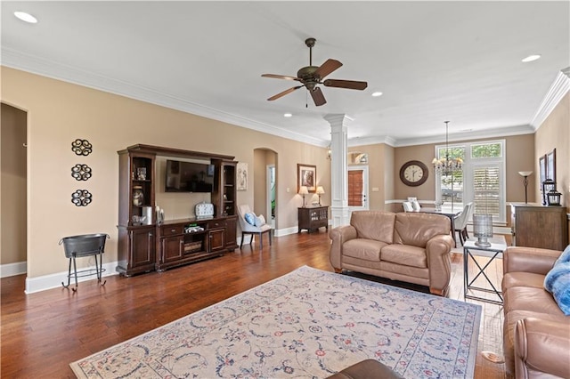 1521 Rue De Fontaine, Covington, LA 70433 - living area featuring arched walkways, dark wood-type flooring, ceiling fan, recessed lighting, and a chandelier