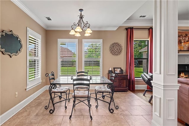 1521 Rue De Fontaine, Covington, LA 70433 - dining area with crown molding and a chandelier