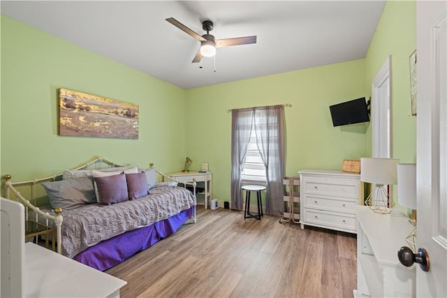 1521 Rue De Fontaine, Covington, LA 70433 - bedroom featuring wood finished floors and ceiling fan