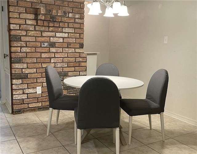 51 Brandon Hall Dr, Destrehan, LA 70047 - dining area with a chandelier and light tile patterned floors