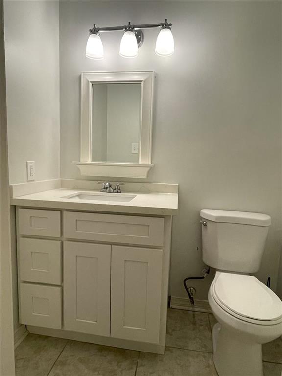 51 Brandon Hall Dr, Destrehan, LA 70047 - half bathroom featuring tile patterned flooring and vanity