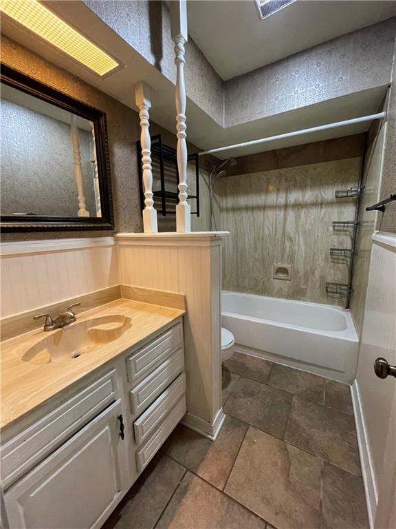 51 Brandon Hall Dr, Destrehan, LA 70047 - bathroom featuring vanity, bathing tub / shower combination, and wainscoting