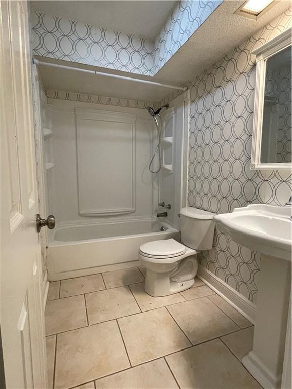 51 Brandon Hall Dr, Destrehan, LA 70047 - full bath featuring wallpapered walls, tub / shower combination, and tile patterned floors