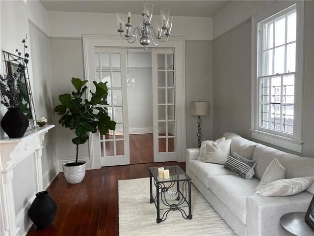 400 Millaudon St, New Orleans, LA 70118 - living area with a chandelier, french doors, and hardwood / wood-style flooring