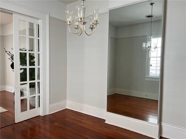 400 Millaudon St, New Orleans, LA 70118 - unfurnished dining area with a chandelier and wood finished floors