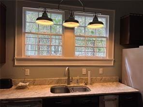 400 Millaudon St, New Orleans, LA 70118 - kitchen with a sink and light stone counters