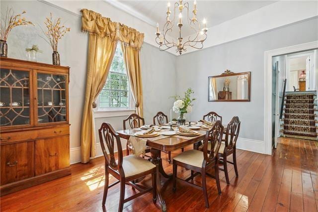 400 Millaudon St, New Orleans, LA 70118 - dining area featuring a chandelier and wood-type flooring