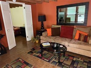 400 Millaudon St, New Orleans, LA 70118 - living area featuring beam ceiling