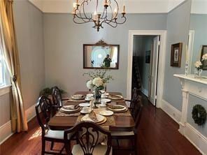 400 Millaudon St, New Orleans, LA 70118 - dining space featuring dark wood-style floors and a chandelier