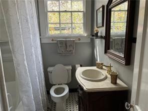 400 Millaudon St, New Orleans, LA 70118 - full bath with healthy amount of natural light, vanity, and shower / bathtub combination with curtain