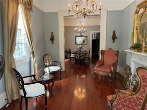 400 Millaudon St, New Orleans, LA 70118 - living area featuring a chandelier and wood finished floors