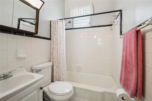 5225 Conti St, New Orleans, LA 70124 - bathroom with tile walls, shower / tub combo, and vanity