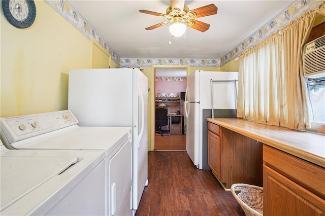 5225 Conti St, New Orleans, LA 70124 - washroom with dark wood-type flooring, washing machine and clothes dryer, and a ceiling fan
