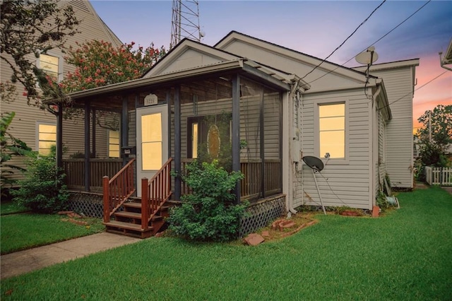 5225 Conti St, New Orleans, LA 70124 - shotgun-style home featuring a front lawn