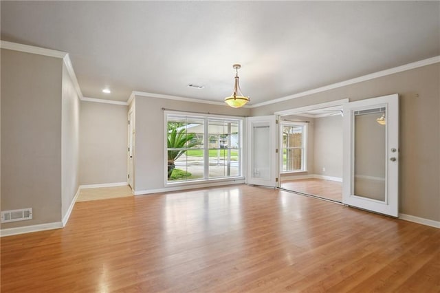 2636 Somerset Dr, New Orleans, LA 70131 - empty room featuring light wood-style flooring and crown molding