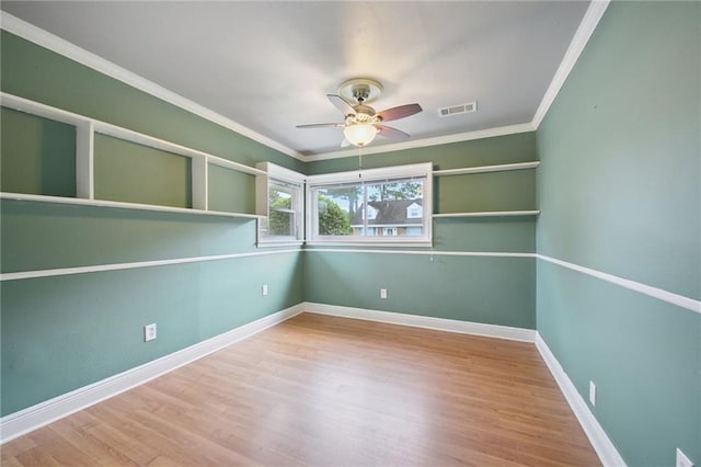 2636 Somerset Dr, New Orleans, LA 70131 - empty room with a ceiling fan, wood finished floors, and ornamental molding