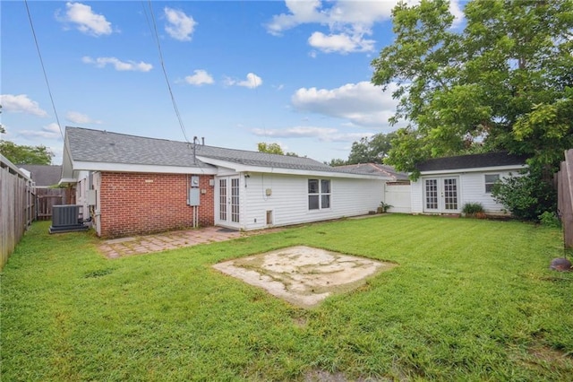 2636 Somerset Dr, New Orleans, LA 70131 - back of house with french doors, a fenced backyard, a patio, and brick siding