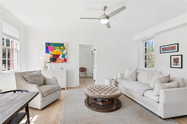 1783 Coliseum St Unit H, New Orleans, LA 70130 - living room featuring light wood-style flooring, healthy amount of natural light, ornamental molding, and a ceiling fan