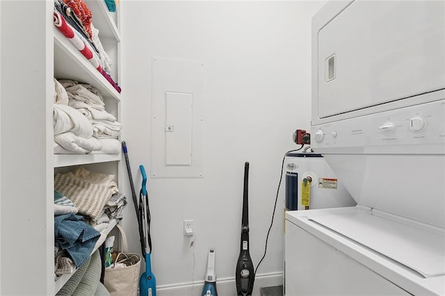 1783 Coliseum St Unit H, New Orleans, LA 70130 - washroom with stacked washer / dryer, electric panel, and water heater